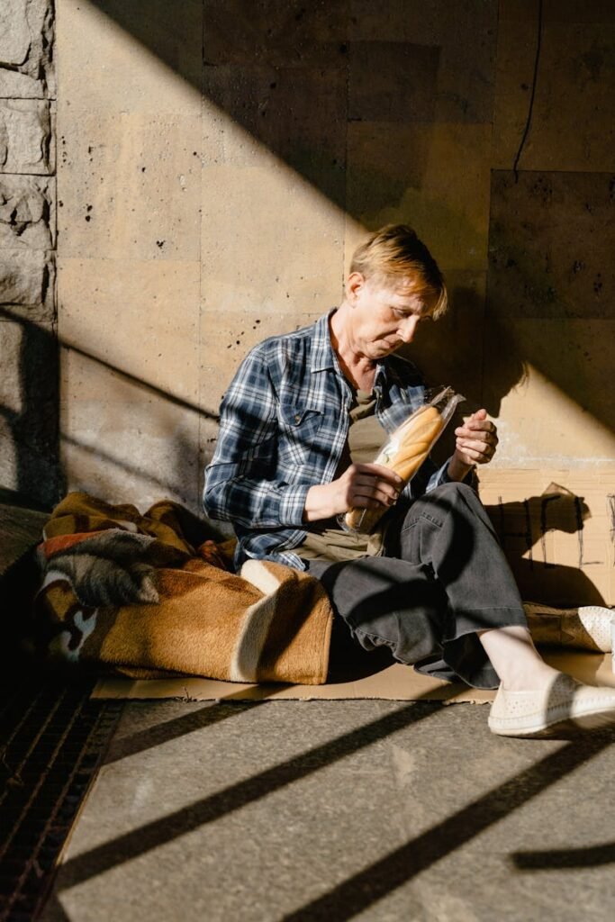A Beggar with a Pack of Bread for Food